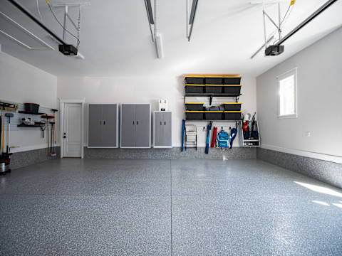 A neat and organized garage with storage.